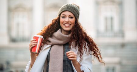 cheerful woman weraing winter clothes